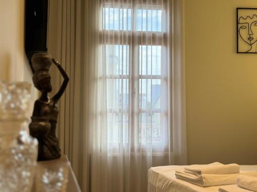 Ένα ή περισσότερα κρεβάτια σε δωμάτιο στο The cosy inn vlora