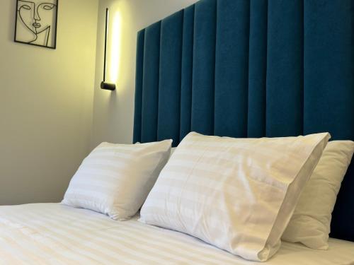 Ένα ή περισσότερα κρεβάτια σε δωμάτιο στο The cosy inn vlora