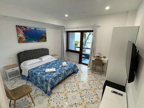 Postel nebo postele na pokoji v ubytování Angela House Sorrento Center