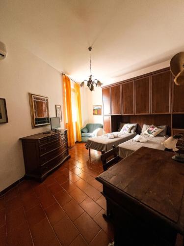 Ένα ή περισσότερα κρεβάτια σε δωμάτιο στο Villa Iris Suvera Chianti