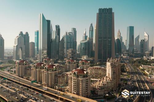 a view of a city with many tall buildings at Fashion avenue Dubai Mall -The Residence in Dubai