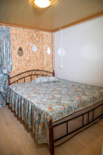 a bedroom with a bed in a room at Dimitra's Apartment in Makri