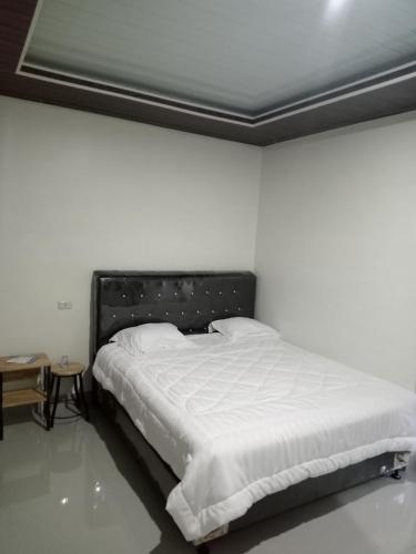 Una cama o camas en una habitación de Talpe villa