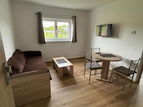 TV a/nebo společenská místnost v ubytování Apartmán Kilián