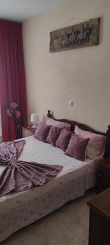 Postel nebo postele na pokoji v ubytování guesthouse emaly
