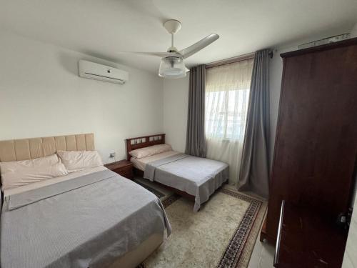 Ένα ή περισσότερα κρεβάτια σε δωμάτιο στο Luxurious penthouse Fouka Bay Ras El- Hekma