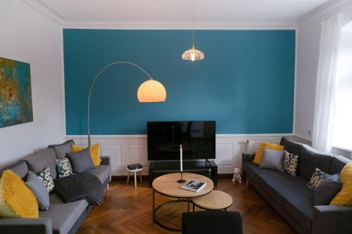 Χώρος καθιστικού στο bella casa - Business&Family - 2 Zimmer direkt neben Schloß, Parkplatz, SmartTV, Netflix, Waschmaschine, 24h Checkin, 71qm, Kingsizebett, Hotelbettwäsche