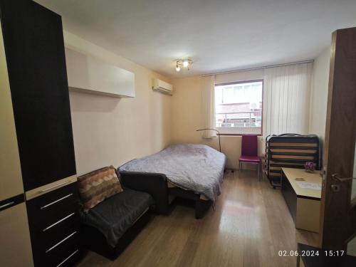 Ένα ή περισσότερα κρεβάτια σε δωμάτιο στο Apartment in the Center 1