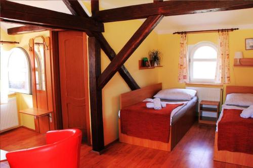 Postel nebo postele na pokoji v ubytování Penzion Relax Kadaň
