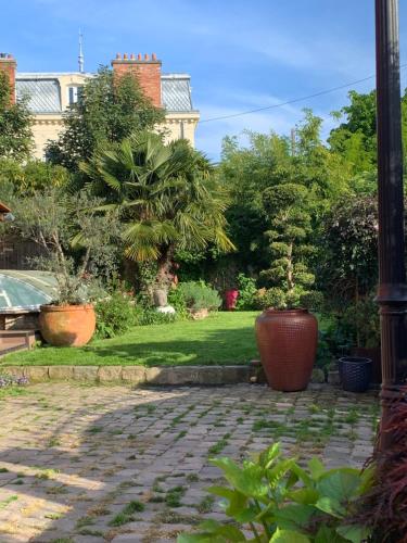 Photo de la galerie de l'établissement Le clos fleuri, à Taverny