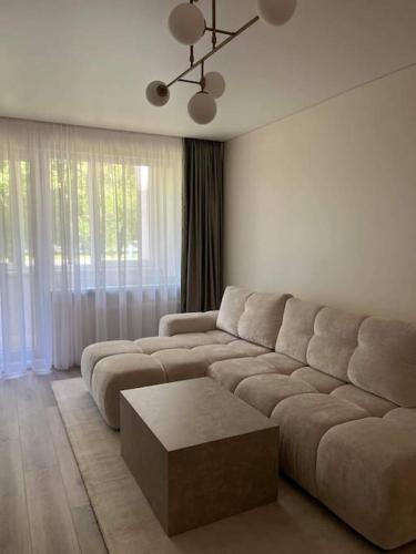 Posezení v ubytování Vakariniai Apartamentai II