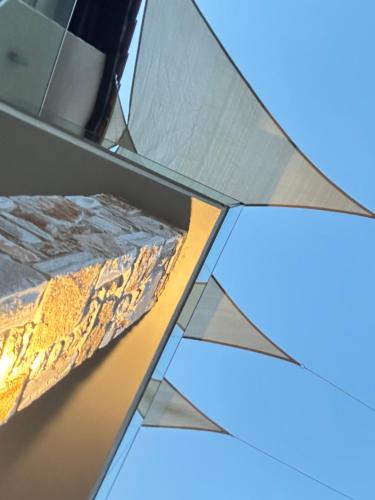 a close up view of a glass window of a building at Natura Bungalows-Villa in Limenas