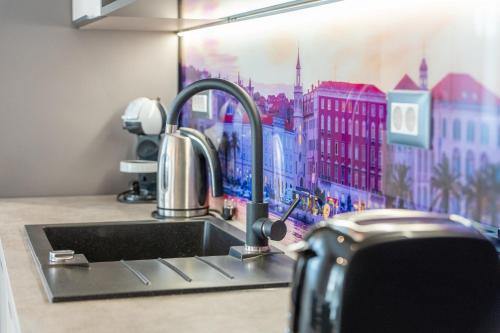 Kuchyň nebo kuchyňský kout v ubytování Apartman Sea Heaven, Kanica