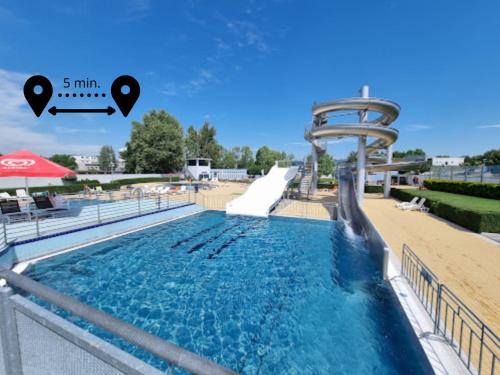 a water slide at a resort with a pool at Valdštejn - pohoda v Českém ráji in Jičín