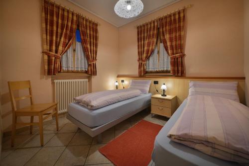 Postel nebo postele na pokoji v ubytování Bait Dal Canton