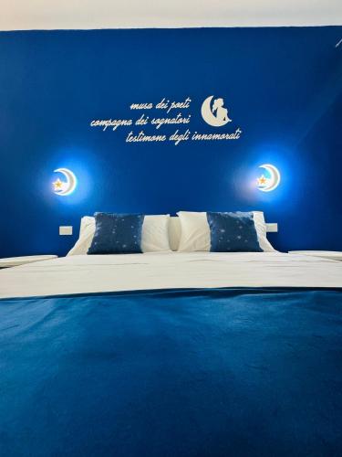 Postel nebo postele na pokoji v ubytování Sirio rooms and apartments