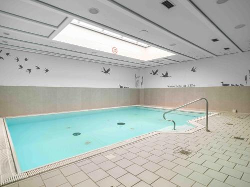 Piscina de la sau aproape de Ferienpark Freesenbruch Wohnung 3 6 - Frieda