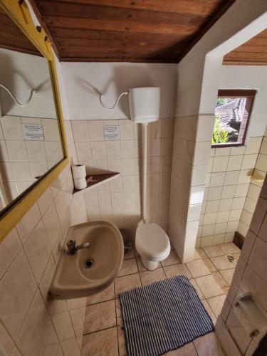 Koupelna v ubytování Pousada Cachoeira