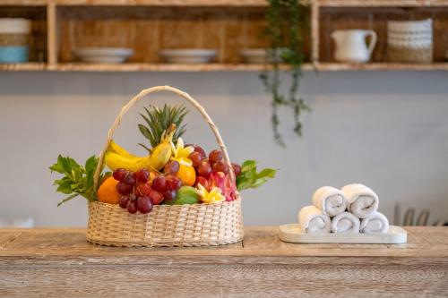 a basket of fruit sitting on a table at ☆ Villa Larissa ☆ Seminyak 2BR Pool Kuta Petitenget in Seminyak