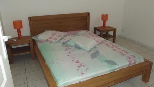 Llit o llits en una habitació de L'Aloes T2