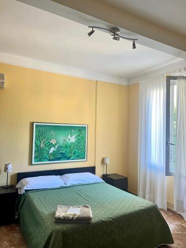Postel nebo postele na pokoji v ubytování Hotel Gabriella