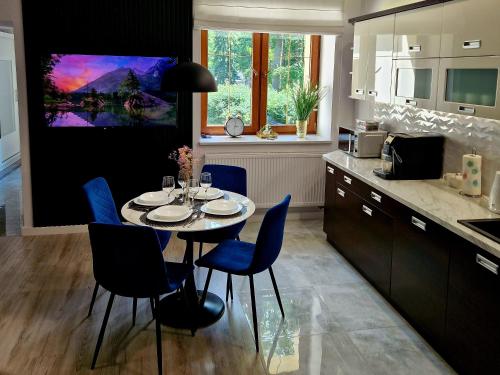Kuchyň nebo kuchyňský kout v ubytování Apartament Mountains Góry Sowie