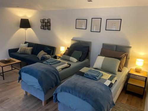 Katil atau katil-katil dalam bilik di Apartament pod Sejdakiem