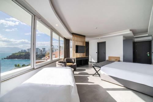 Avşar Boutique Hotel 객실 침대