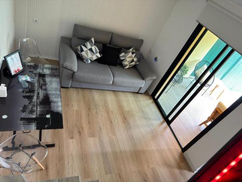 Posezení v ubytování Duplex Sonemar Pool