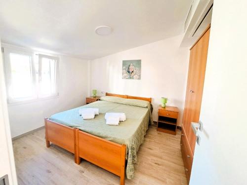 A bed or beds in a room at Case Vacanze Pietragrande