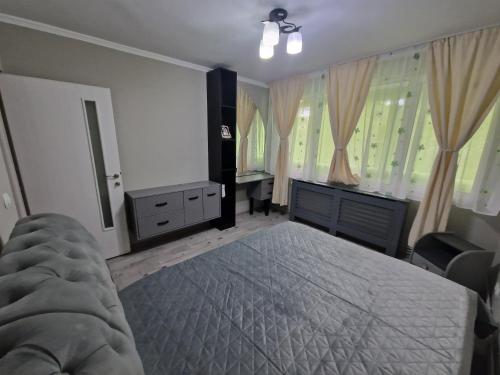 Ένα ή περισσότερα κρεβάτια σε δωμάτιο στο Apartament Luna