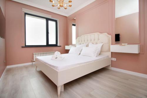 Llit o llits en una habitació de Forum Residence