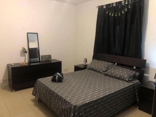Postel nebo postele na pokoji v ubytování Sol's Sliema Homestay