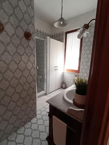 Koupelna v ubytování Casa vancanza Sciamandola