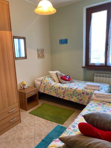 Postel nebo postele na pokoji v ubytování Casolare di Adele