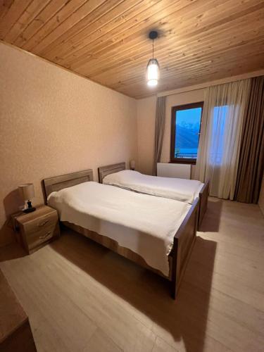 Postel nebo postele na pokoji v ubytování Martha Guest House