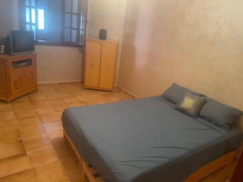 Ένα ή περισσότερα κρεβάτια σε δωμάτιο στο Maison vacance Saidia à proximité plage