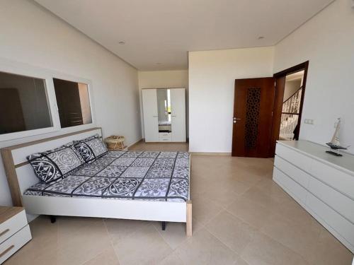 Katil atau katil-katil dalam bilik di Villa Beach & Garden