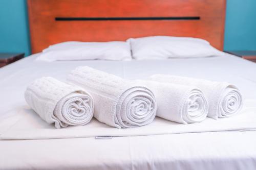 Letto o letti in una camera di Blue Dream Poseidi