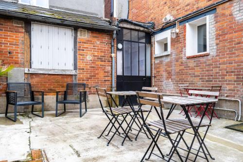 Patio nebo venkovní prostory v ubytování Studio cosy RDC, calme avec cour extérieure