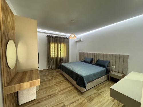 Ein Bett oder Betten in einem Zimmer der Unterkunft Babo's Villa