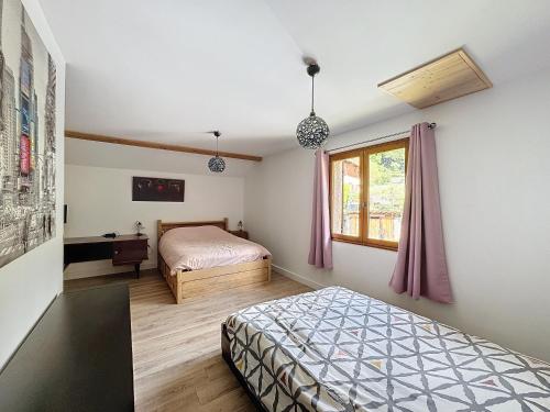 Postel nebo postele na pokoji v ubytování CHALET DON PAPA