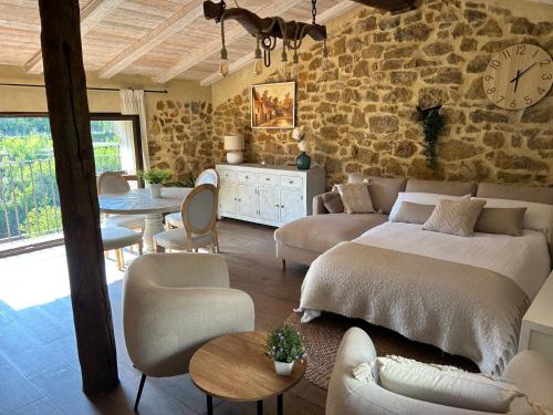 Postel nebo postele na pokoji v ubytování La Esencia Casa Rural