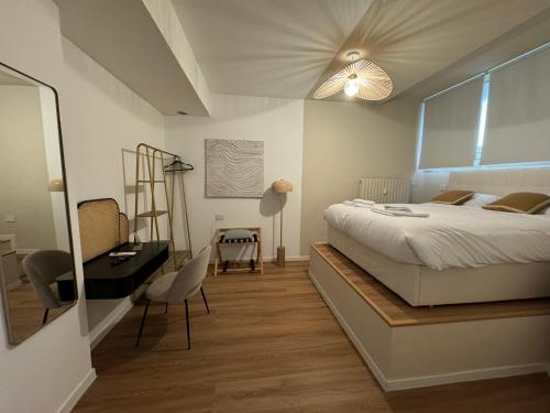 Postel nebo postele na pokoji v ubytování D-HOME Suites