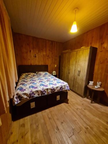 Ένα ή περισσότερα κρεβάτια σε δωμάτιο στο Pousada Recanto da Paz