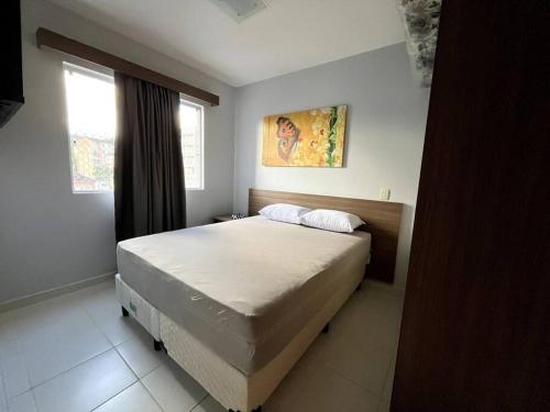 Postel nebo postele na pokoji v ubytování Flat 625 - Diferenciado com Ar no quarto e na sala