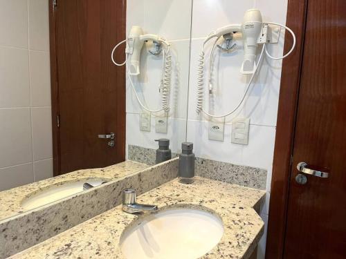 Koupelna v ubytování Flat 625 - Diferenciado com Ar no quarto e na sala