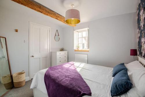 Katil atau katil-katil dalam bilik di Charming flat in lovely rural location