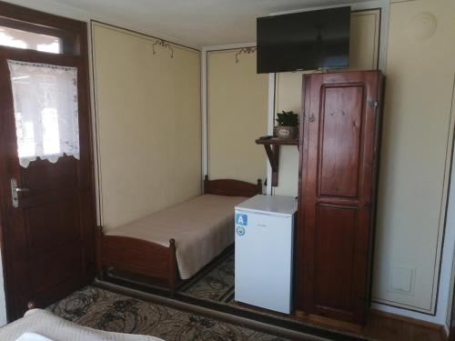 TV a/nebo společenská místnost v ubytování Guest Rooms Dona