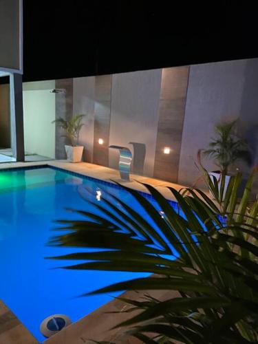 Kolam renang di atau dekat dengan Casa na Praia do Preá, com Piscina